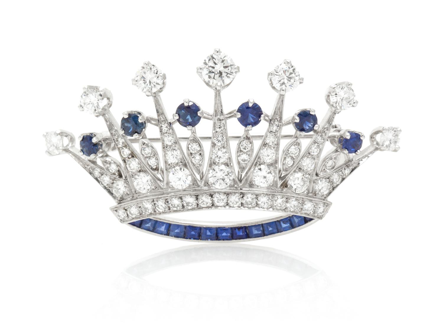 A Platinum, Sapphire and Diamond Crown Brooch, 6.50 dwts.