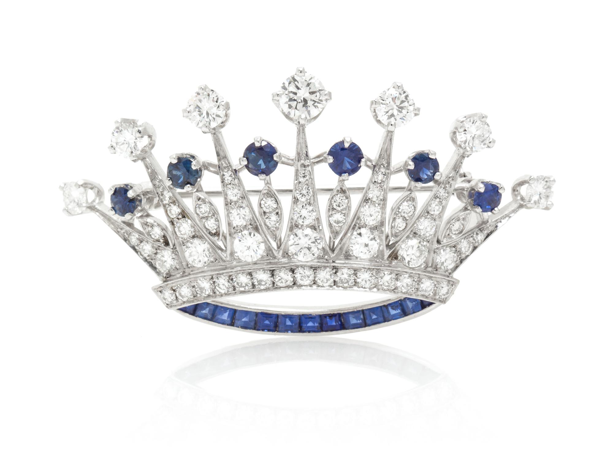 A Platinum, Sapphire and Diamond Crown Brooch, 6.50 dwts.