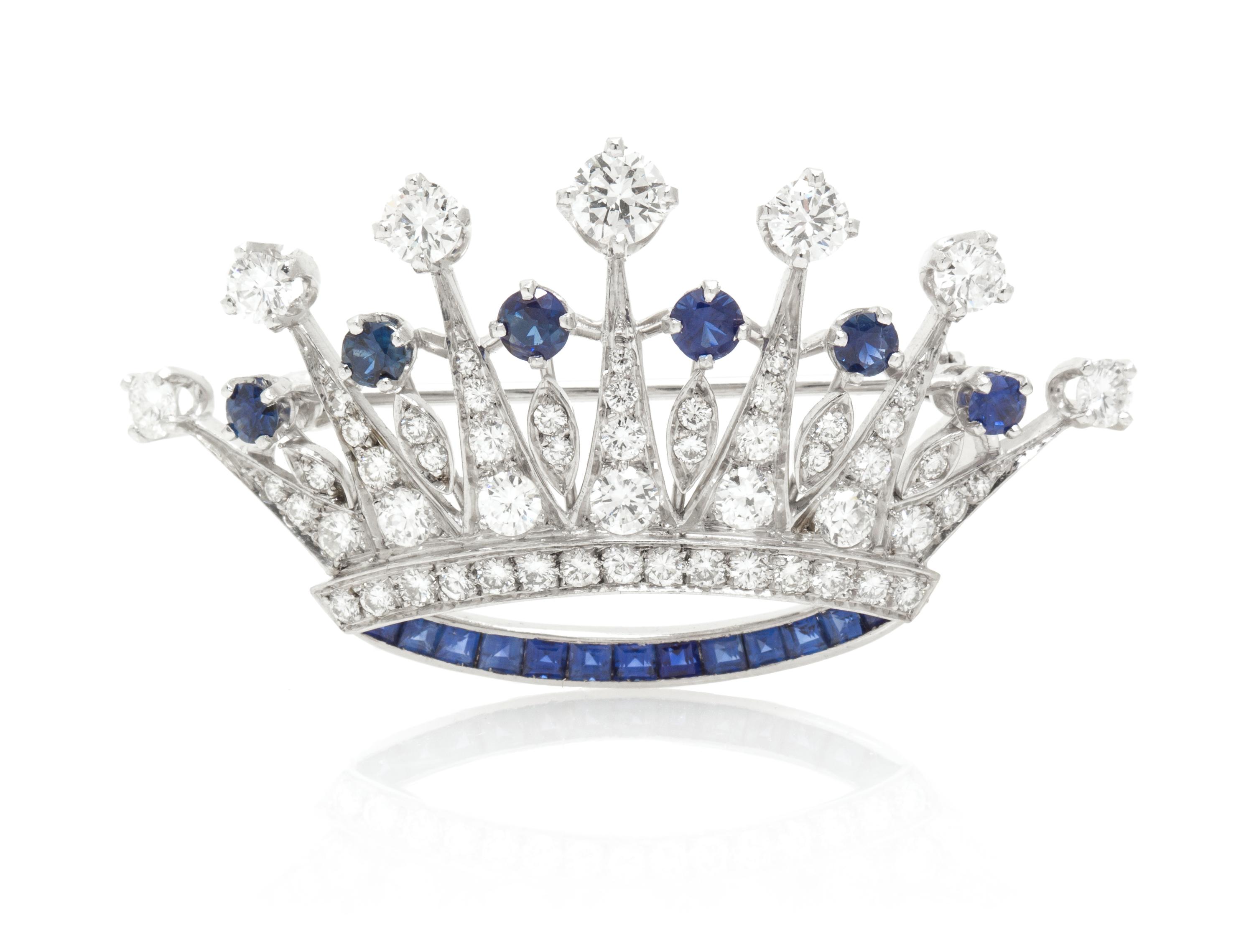 A Platinum, Sapphire and Diamond Crown Brooch, 6.50 dwts.