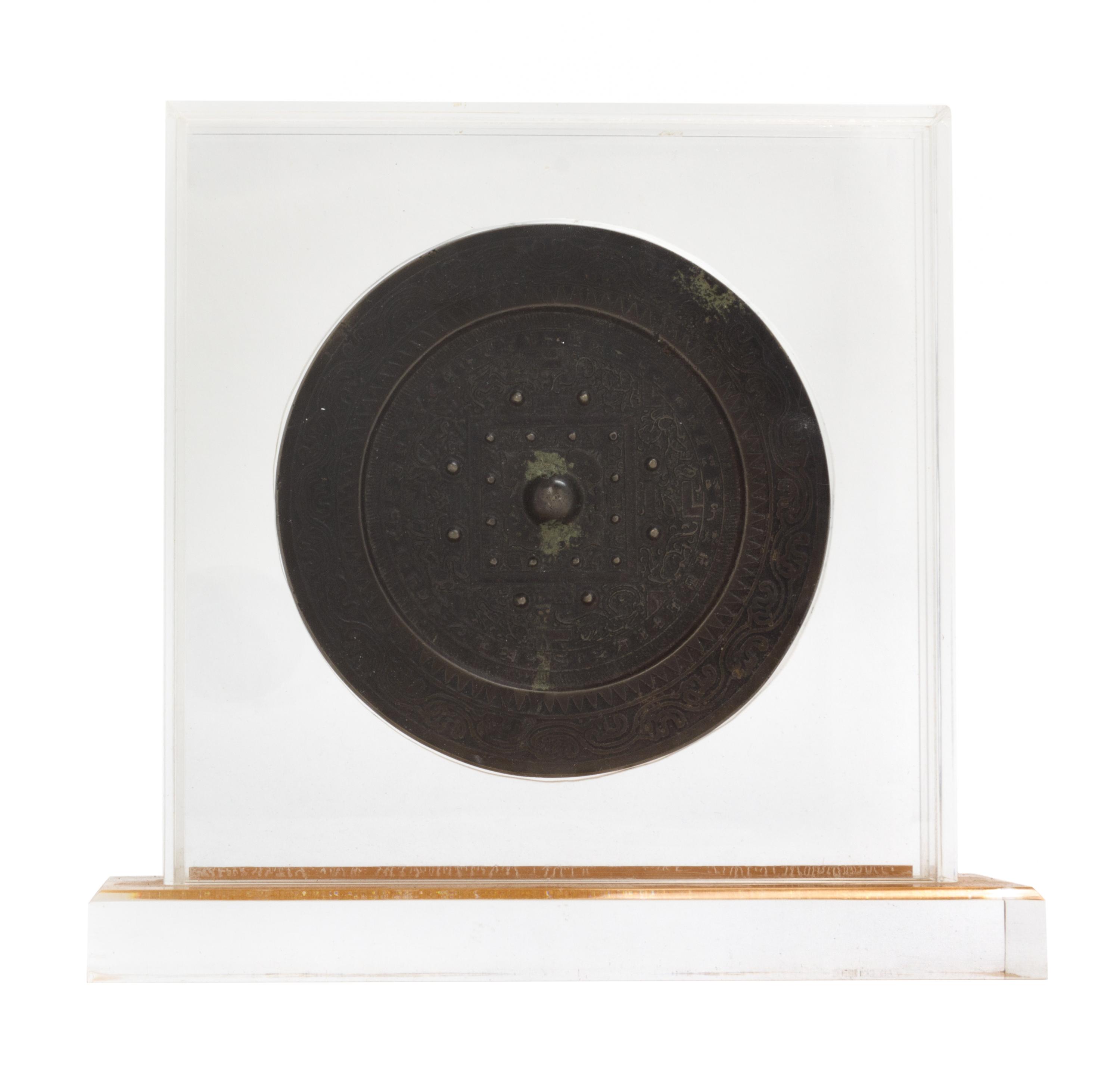 A Bronze 'TLV' Mirror Diameter 6 inches. — WESTERN HAN DYNASTY (206 B.C.- 8 A.D.)