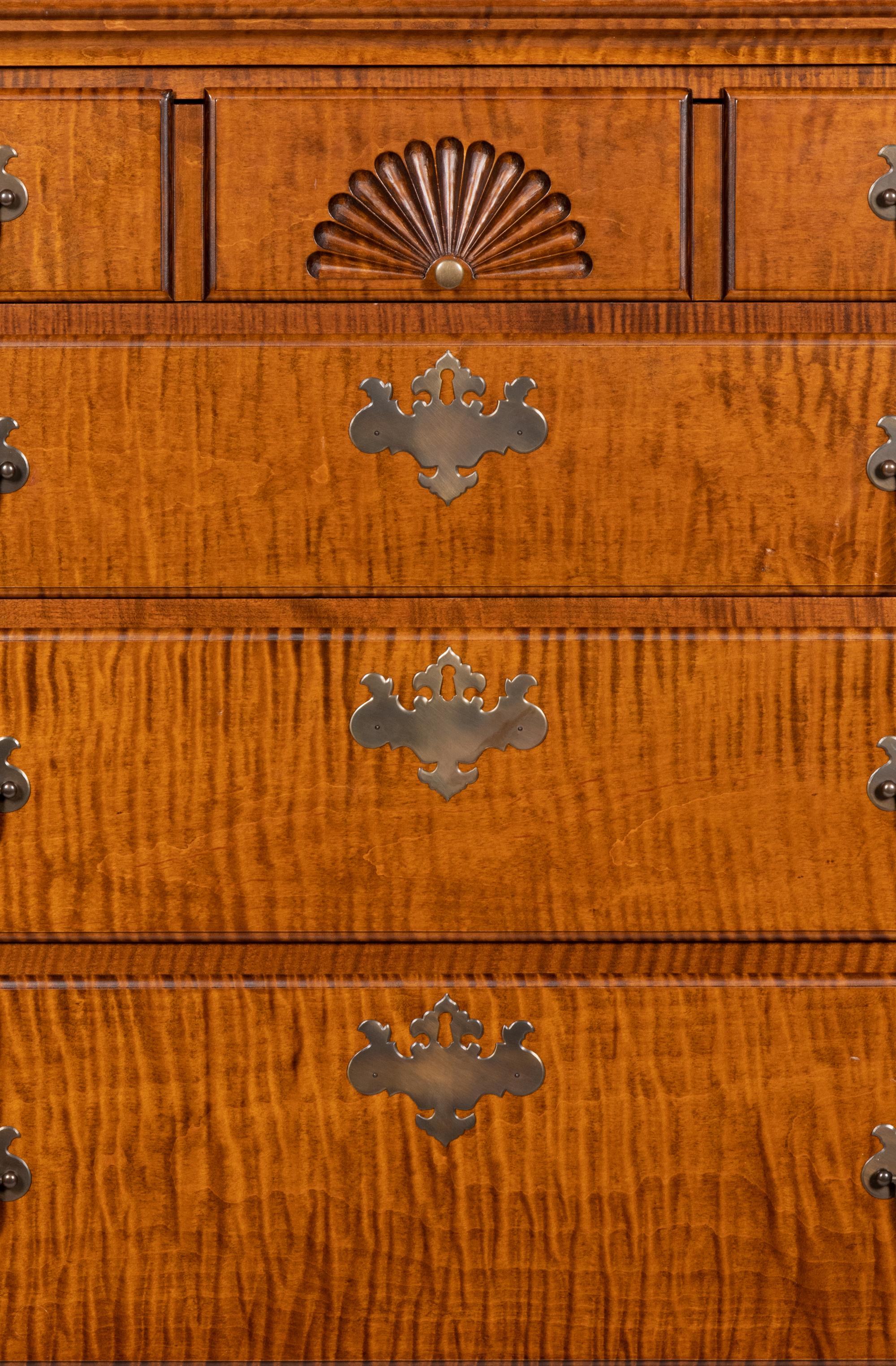 A Chippendale Style Tiger Maple Tall Chest