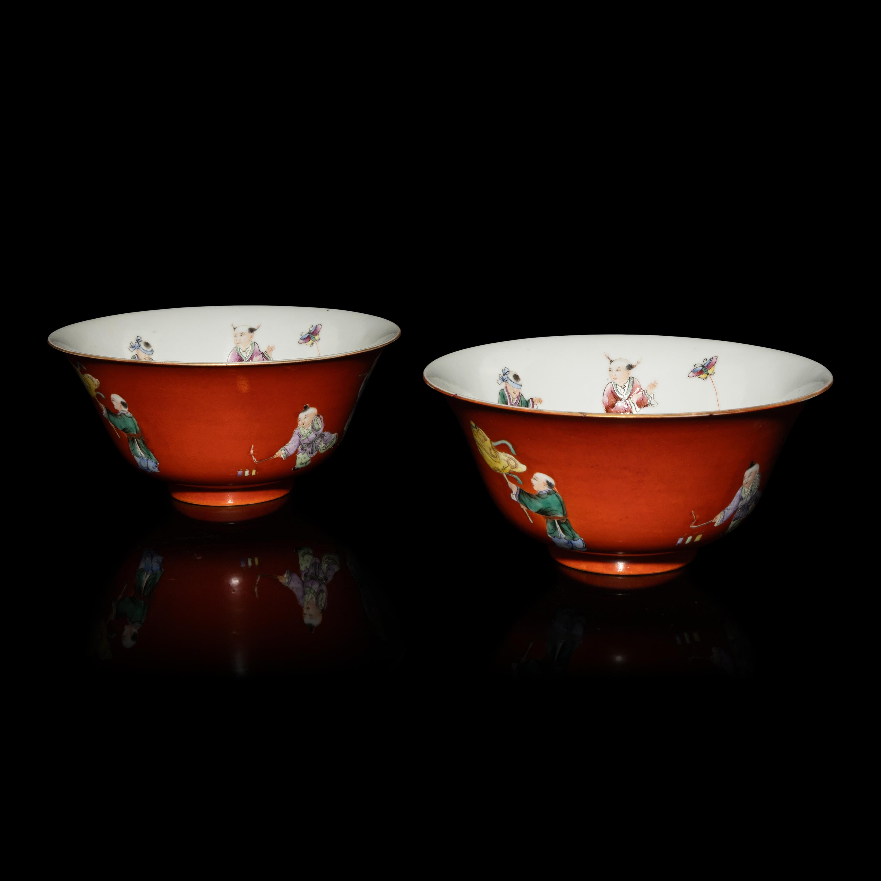 A Pair of Chinese Coral-Red Ground Famille Rose Porcelain Bowls, Late 19th-20th Century — 清晚期 珊瑚紅地粉彩童子圖碗一對