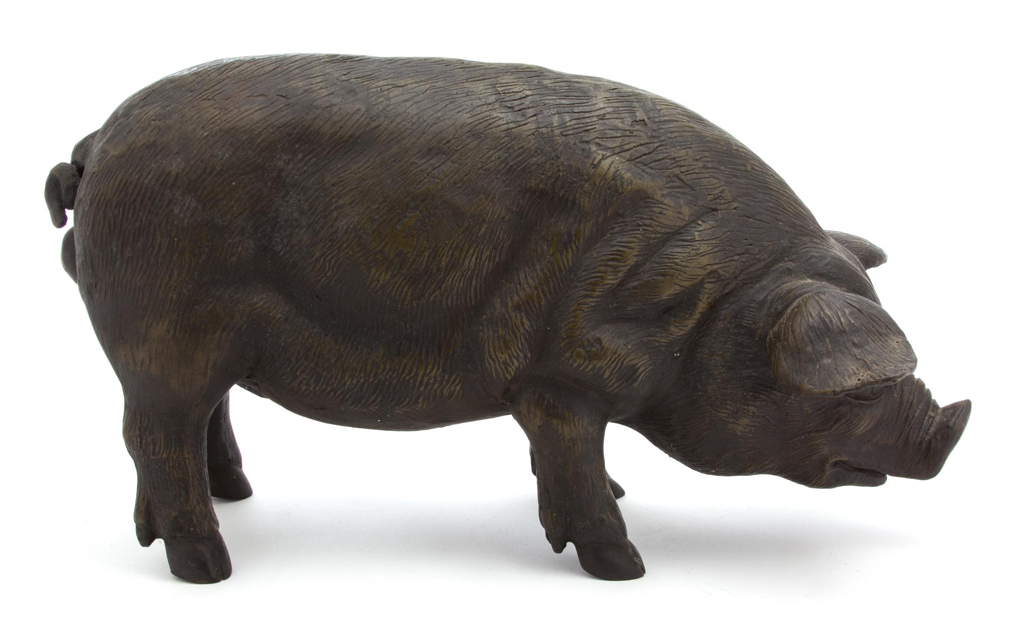 A Collection of Three Metal Pigs Largest height 9 x length 17 1/2 inches.