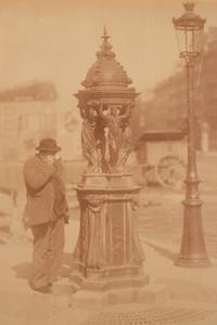 A group of four photographs ( Untitled [man at fountain], circa 1900s; Boutique empire, 14 rue de Grammont , 1903-1904; Hôtel de Neuville, rue Alphonse de Neuville, 1905-1906; Fontaine, faubourg Saint-Martin, 1912)