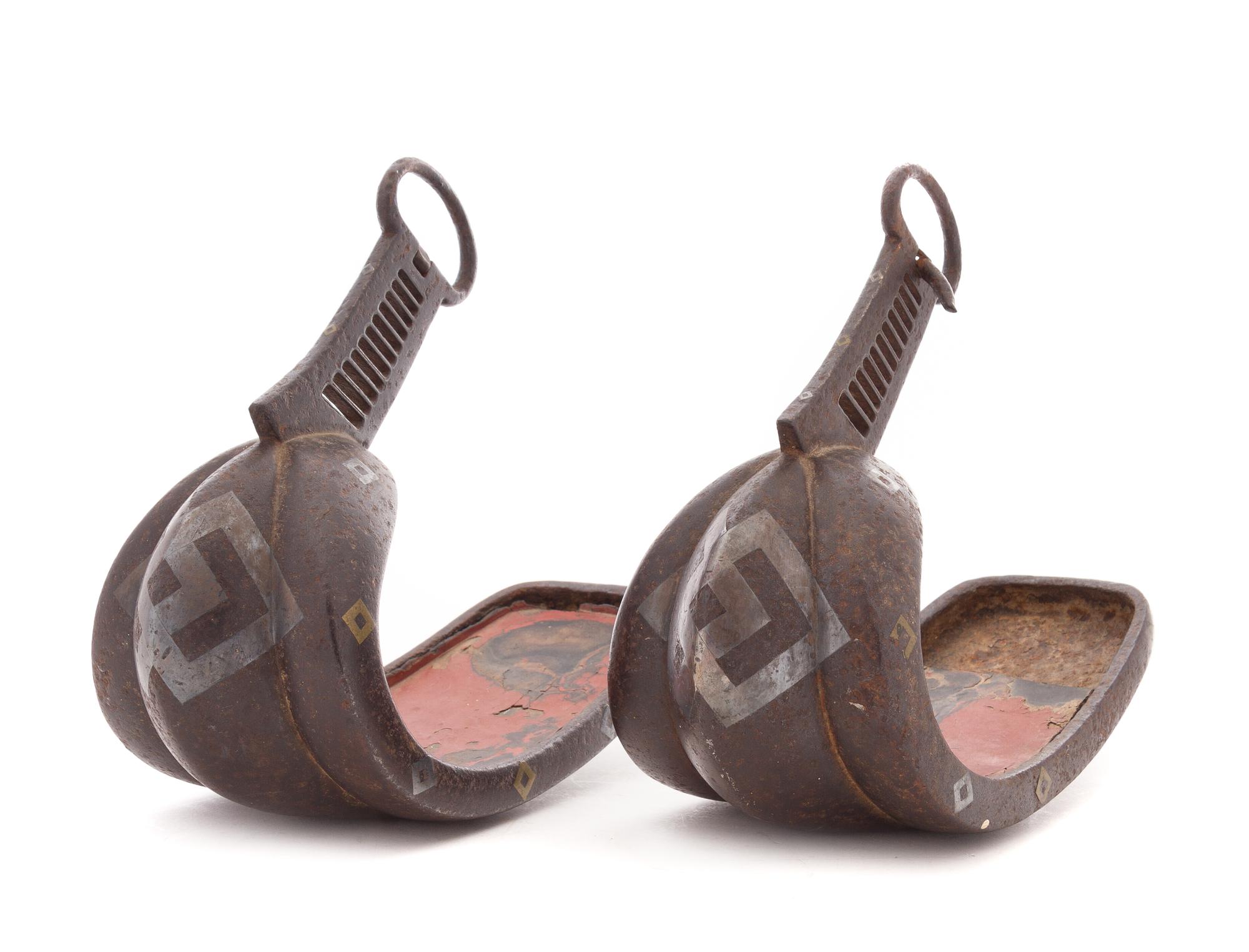 A Pair of Japanese Silver and Bronze Inlaid Iron Stirrups, Abumi Height 10 1/8 x length 11 3/4 inches.