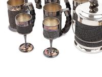 A Set of Silver-Plate and Hide Drinkware