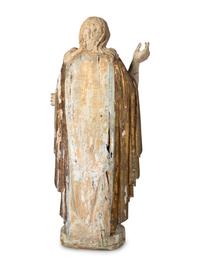 A Continental Painted and Parcel Giltwood Figure