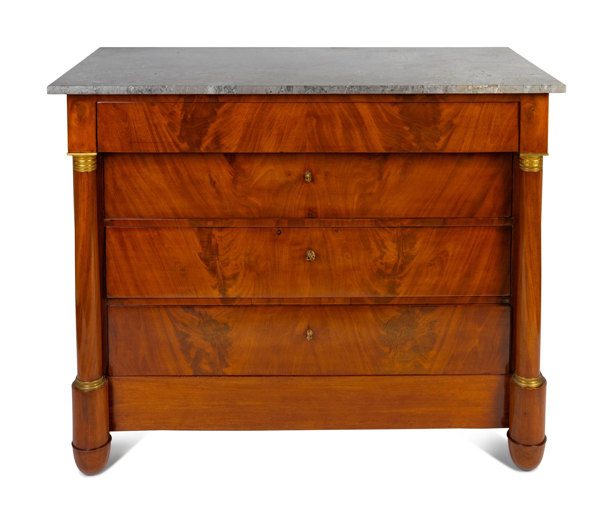 A Louis Philippe Style Gilt Bronze Mounted Mahogany Marble-Top Chest of Drawers