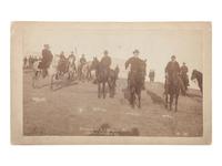 [LATE INDIAN WARS]. TRAGER & FORD, photographers. Boudoir photograph of General Nelson Miles and Buffalo Bill Cody at Wounded Knee. Chadron, Nebraska: Northwestern Photographic Co., January 1891.