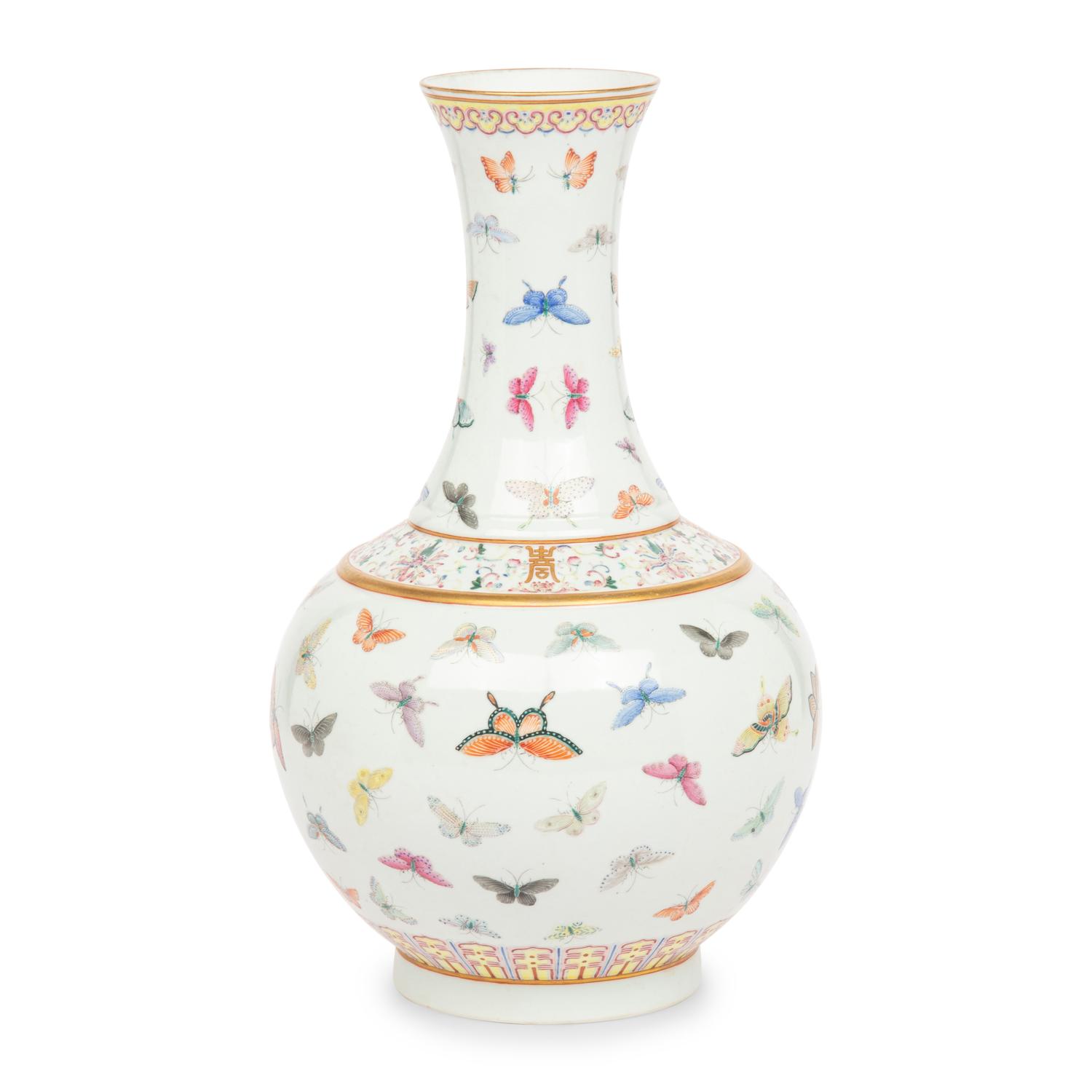 A Chinese Famille Rose 'Butterflies' Bottle Vase, Guangxu Six-Character Mark 光緒款 粉彩百蝶圖賞瓶