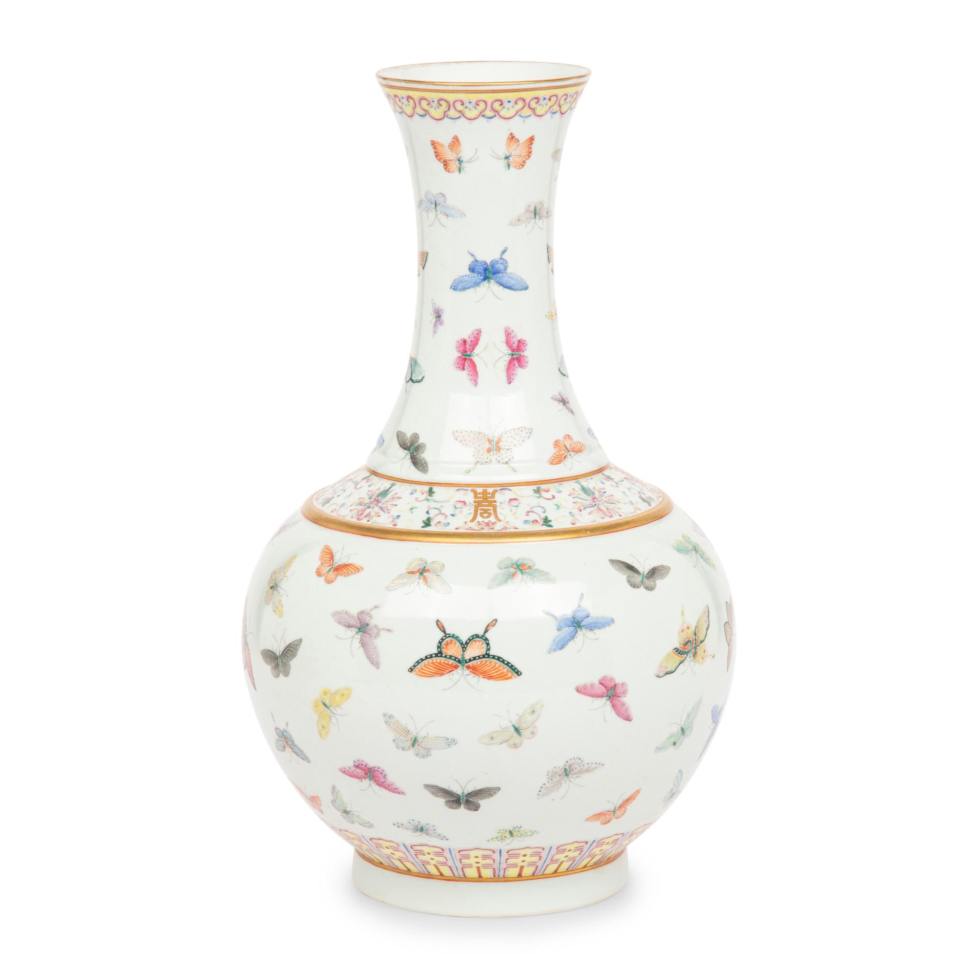 A Chinese Famille Rose 'Butterflies' Bottle Vase, Guangxu Six-Character Mark 光緒款 粉彩百蝶圖賞瓶