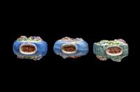 RELEASED TO MUSEUM - Three Chinese Famille Rose Molded Porcelain Snuff Bottles