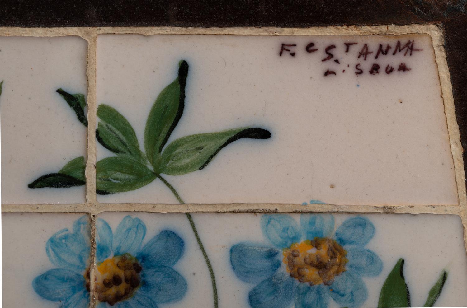 A Wrought Iron and Tile Bench and Pair of Chairs
