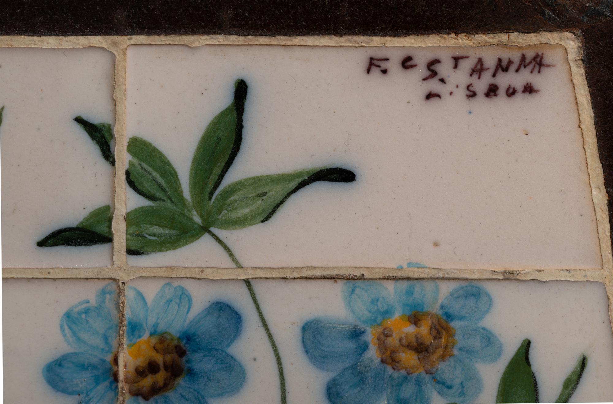 A Wrought Iron and Tile Bench and Pair of Chairs