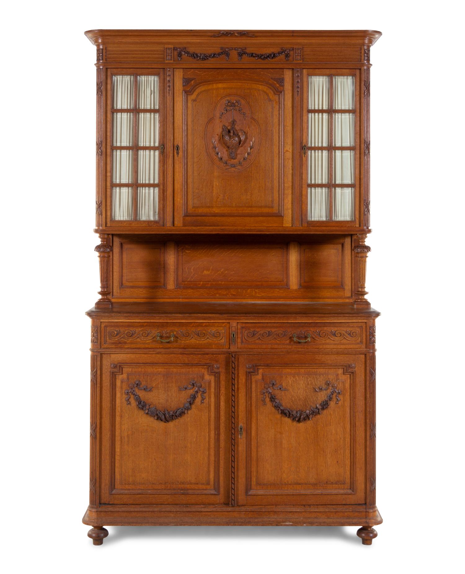 A French Carved Oak Buffet à Deux Corps