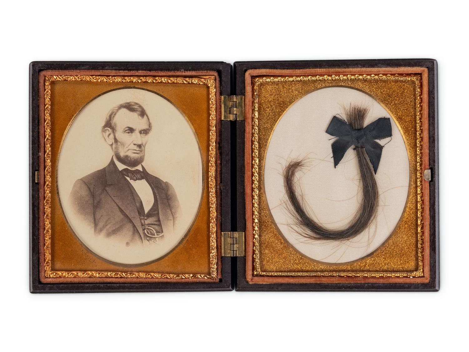 [LINCOLN FAMILY]. Locks of hair purportedly from Abraham Lincoln, Mary Todd Lincoln, and William ("Willie") Lincoln.