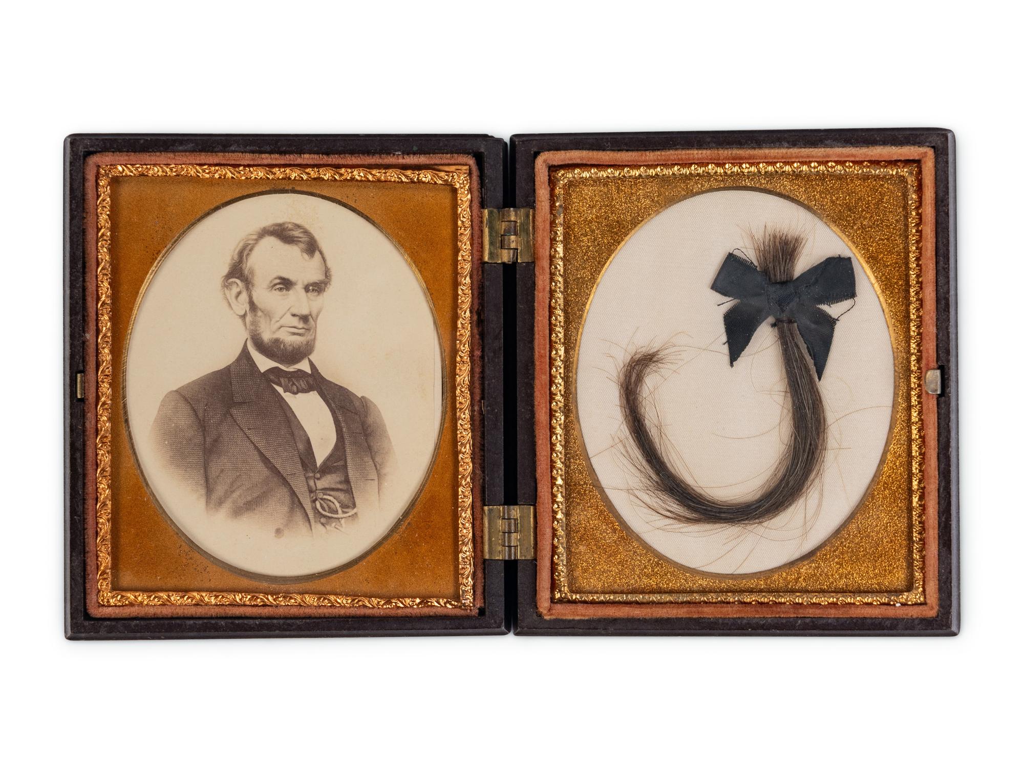 [LINCOLN FAMILY]. Locks of hair purportedly from Abraham Lincoln, Mary Todd Lincoln, and William ("Willie") Lincoln.