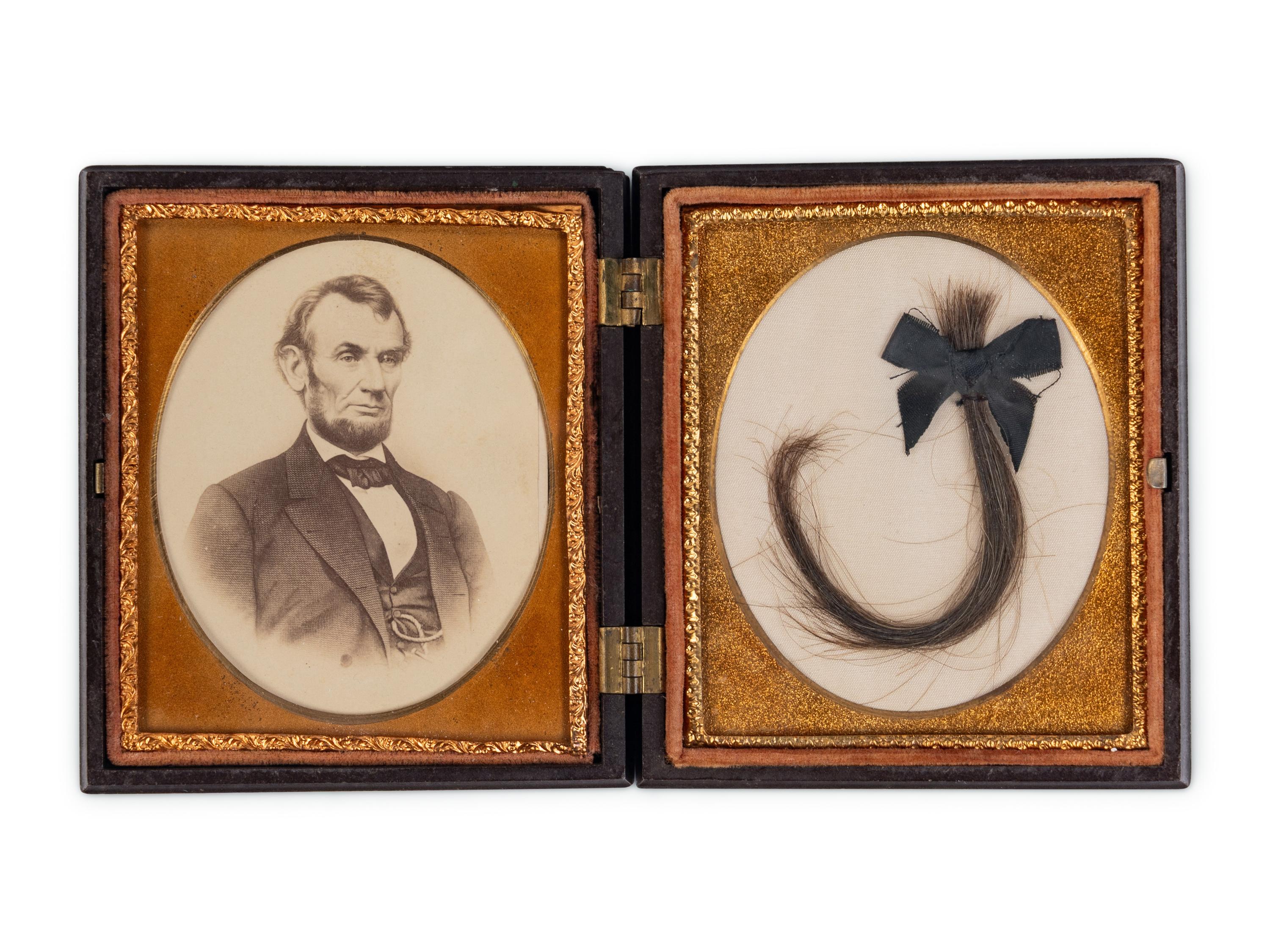 [LINCOLN FAMILY]. Locks of hair purportedly from Abraham Lincoln, Mary Todd Lincoln, and William ("Willie") Lincoln.