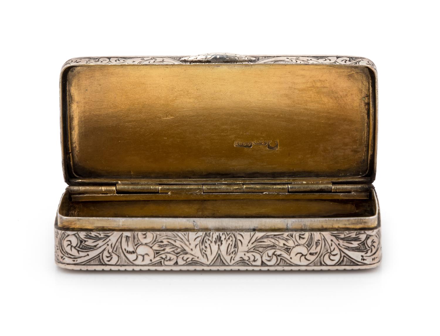 A Russian Silver and Niello Snuff Box, Maker's Mark Obscured, Moscow, 1857, the case worked to show foliate scrolls.