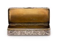 A Russian Silver and Niello Snuff Box, Maker's Mark Obscured, Moscow, 1857, the case worked to show foliate scrolls.