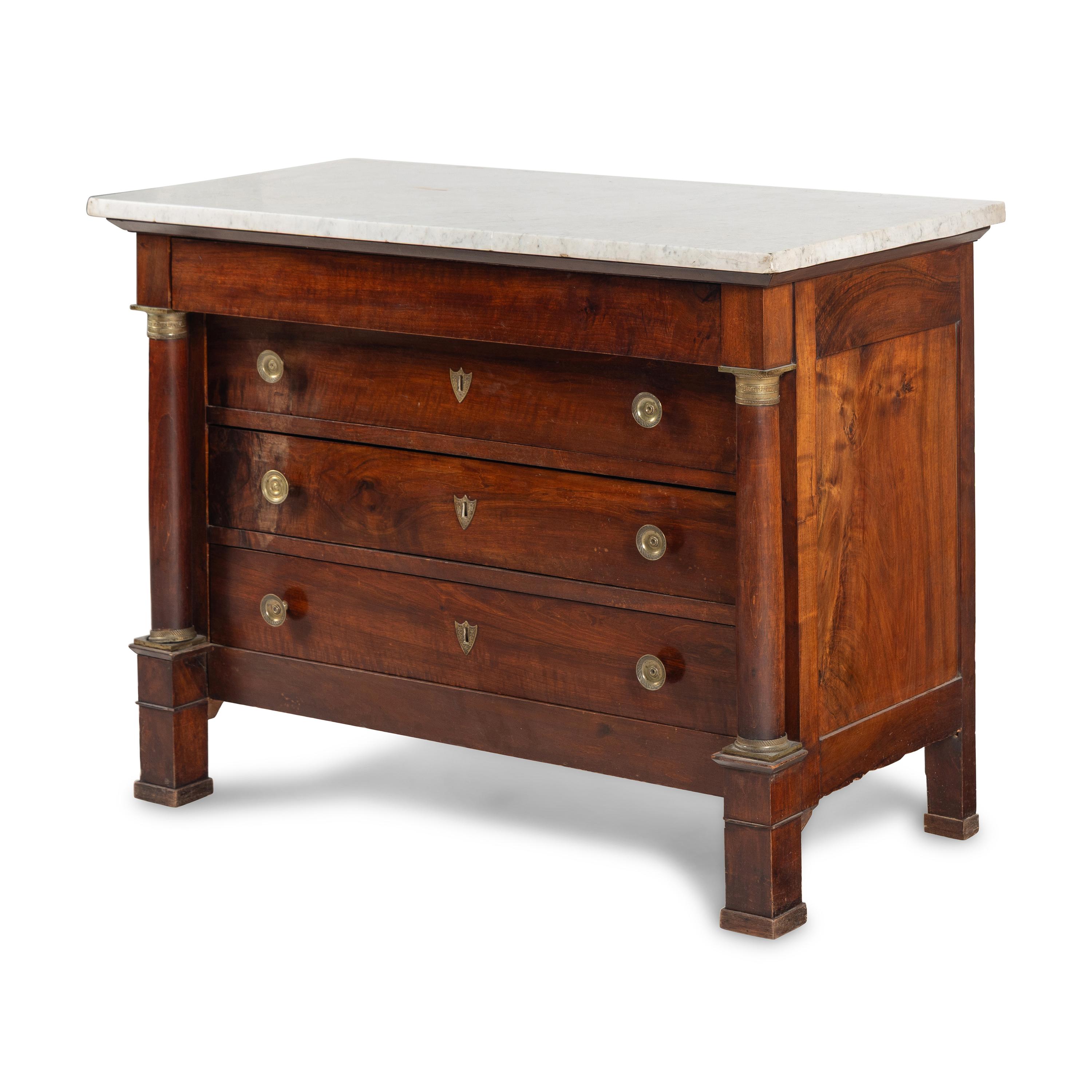 An Empire Gilt-Metal Mounted Walnut Marble-Top Commode