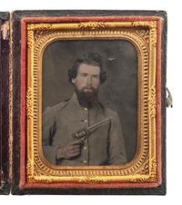 [CIVIL WAR]. Ninth plate ruby ambrotype of Confederate cavalryman holding a Whitney Revolver, with possible attribution to Tennessee.