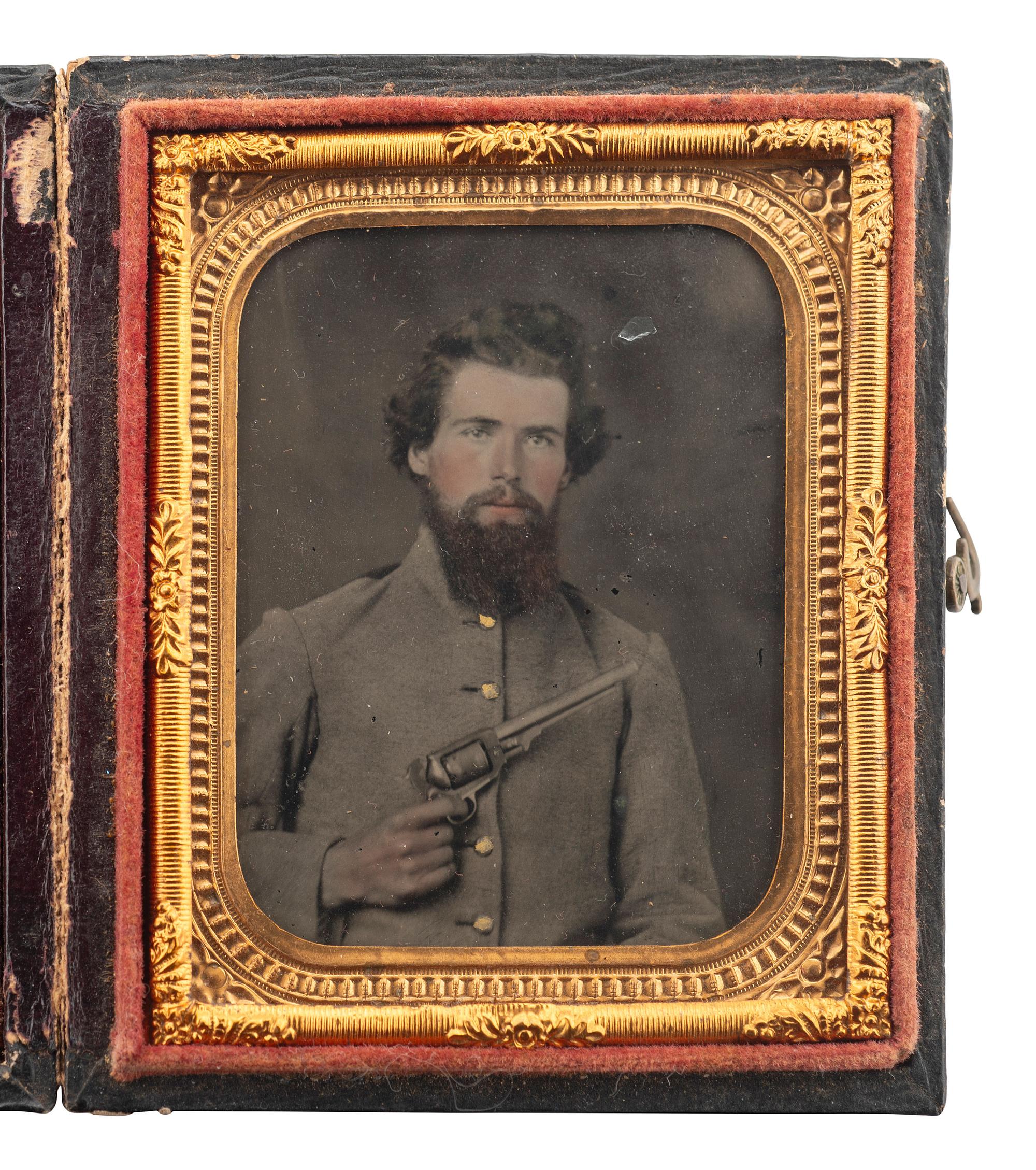 [CIVIL WAR]. Ninth plate ruby ambrotype of Confederate cavalryman holding a Whitney Revolver, with possible attribution to Tennessee.