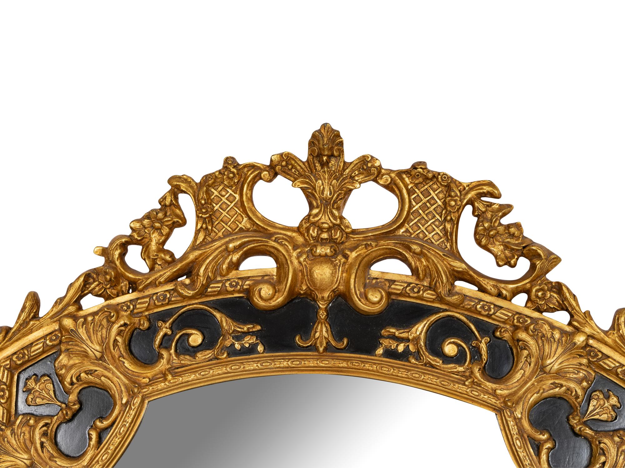 A Large Rococo Style Ebonized Parcel Gilt Pier Mirror