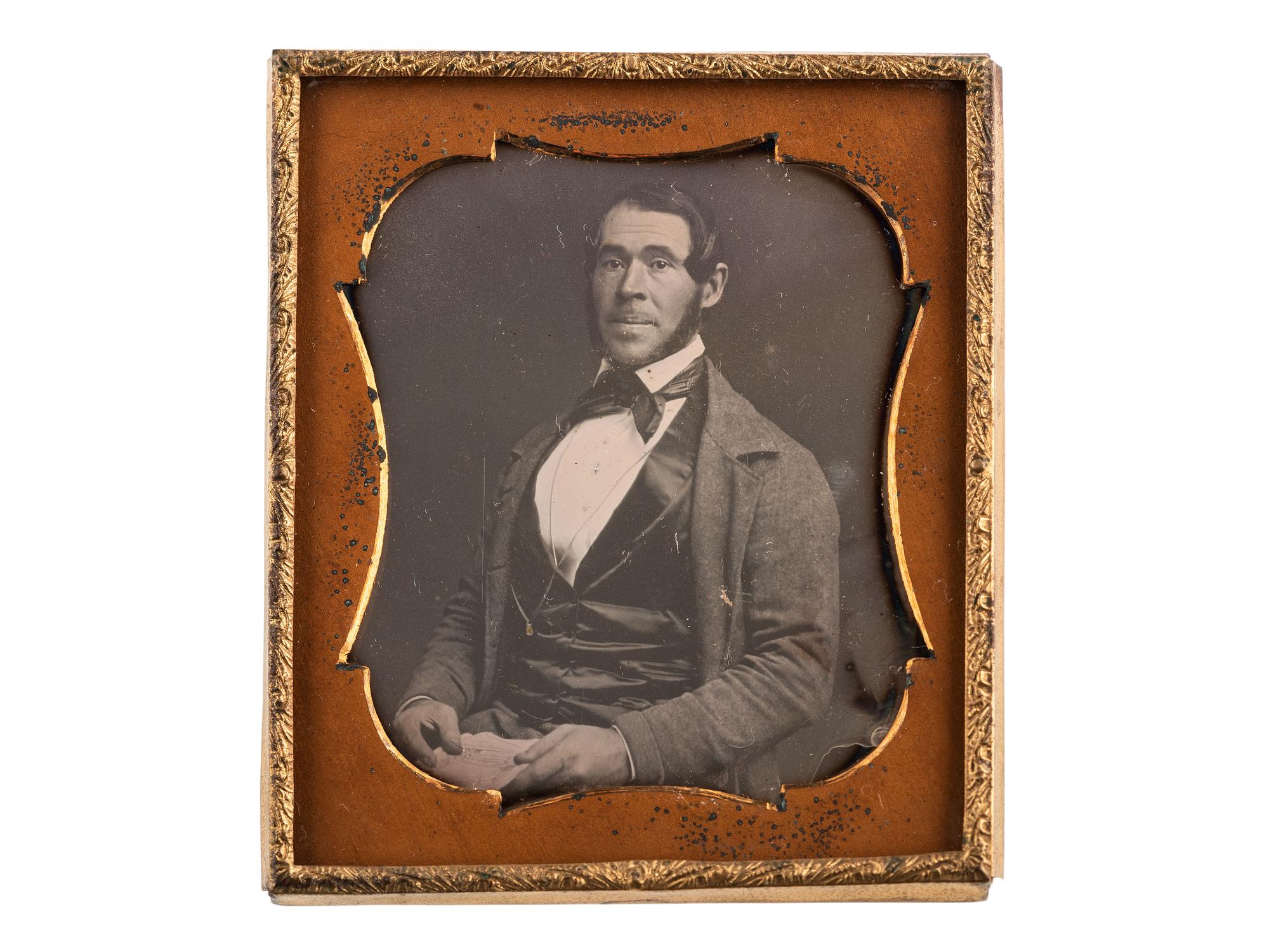 [EARLY PHOTOGRAPHY]. A group of 2 daguerreotypes, incl. sixth plate portrait of African American gentleman.