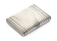 A Russian Silver Cigarette Case, Mark of Ivan Kurtikov, St. Petersburg, early 20th century, the case having diagonal reeded decoration