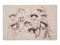[NATIVE AMERICANS]. Cabinet card of female Indian School students with ledger drawing on verso.