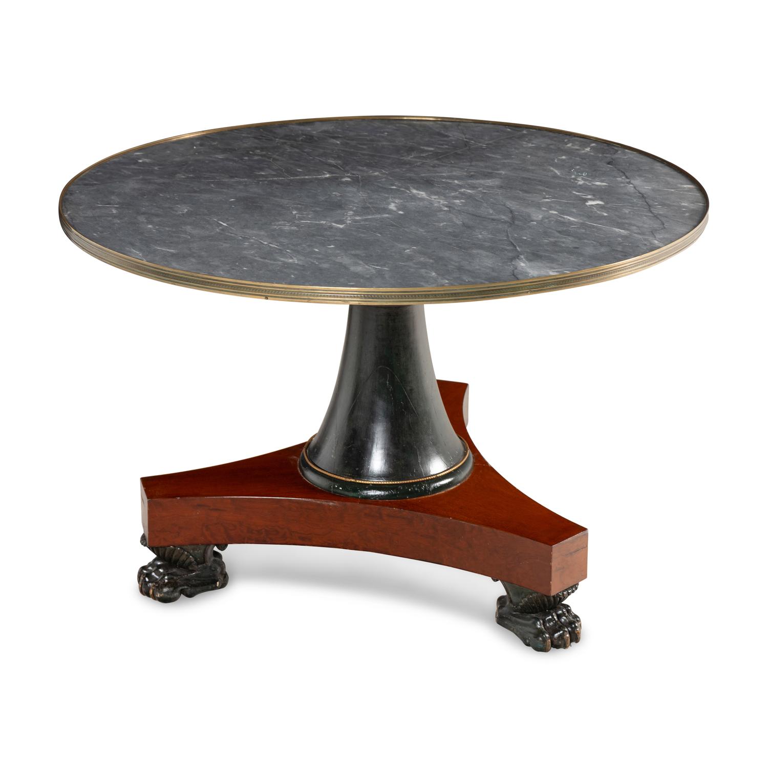 A Russian or Baltic Neoclassical Part-Ebonized Mahogany Marble-Top Center Table