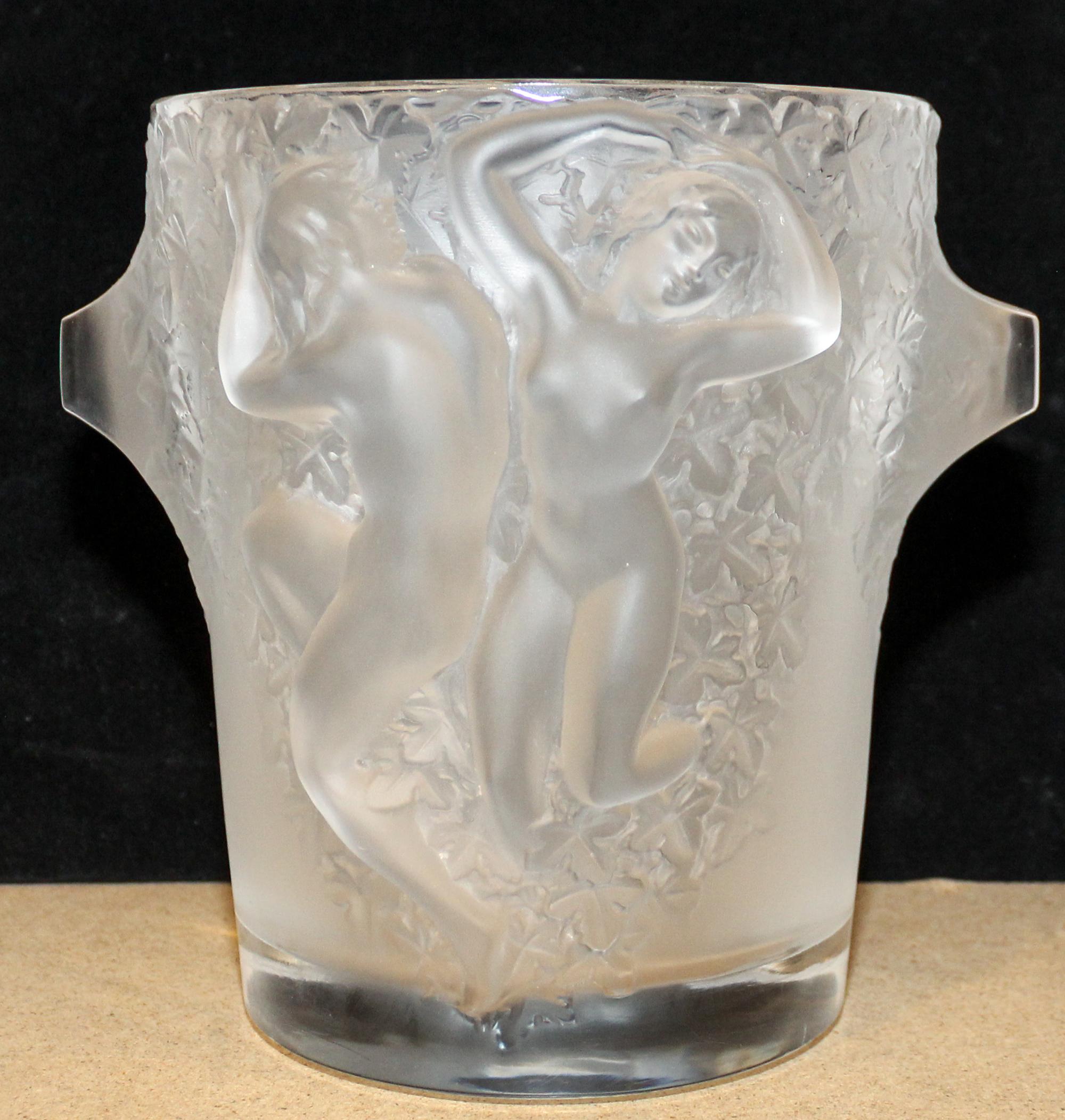 A Lalique Molded and Frosted Glass Ice Bucket. Height 9 1/4 inches.