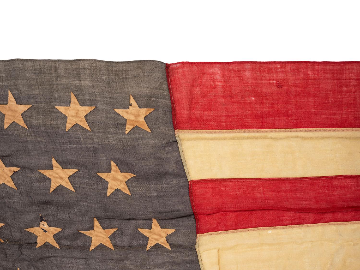[SPANISH AMERICAN WAR]. 45-star Spanish American War-era flag identified to George W. Potter, Company K, 2nd Massachusetts Infantry, with related stereoviews, bookends, and other imprints.