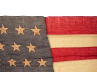 [SPANISH AMERICAN WAR]. 45-star Spanish American War-era flag identified to George W. Potter, Company K, 2nd Massachusetts Infantry, with related stereoviews, bookends, and other imprints.