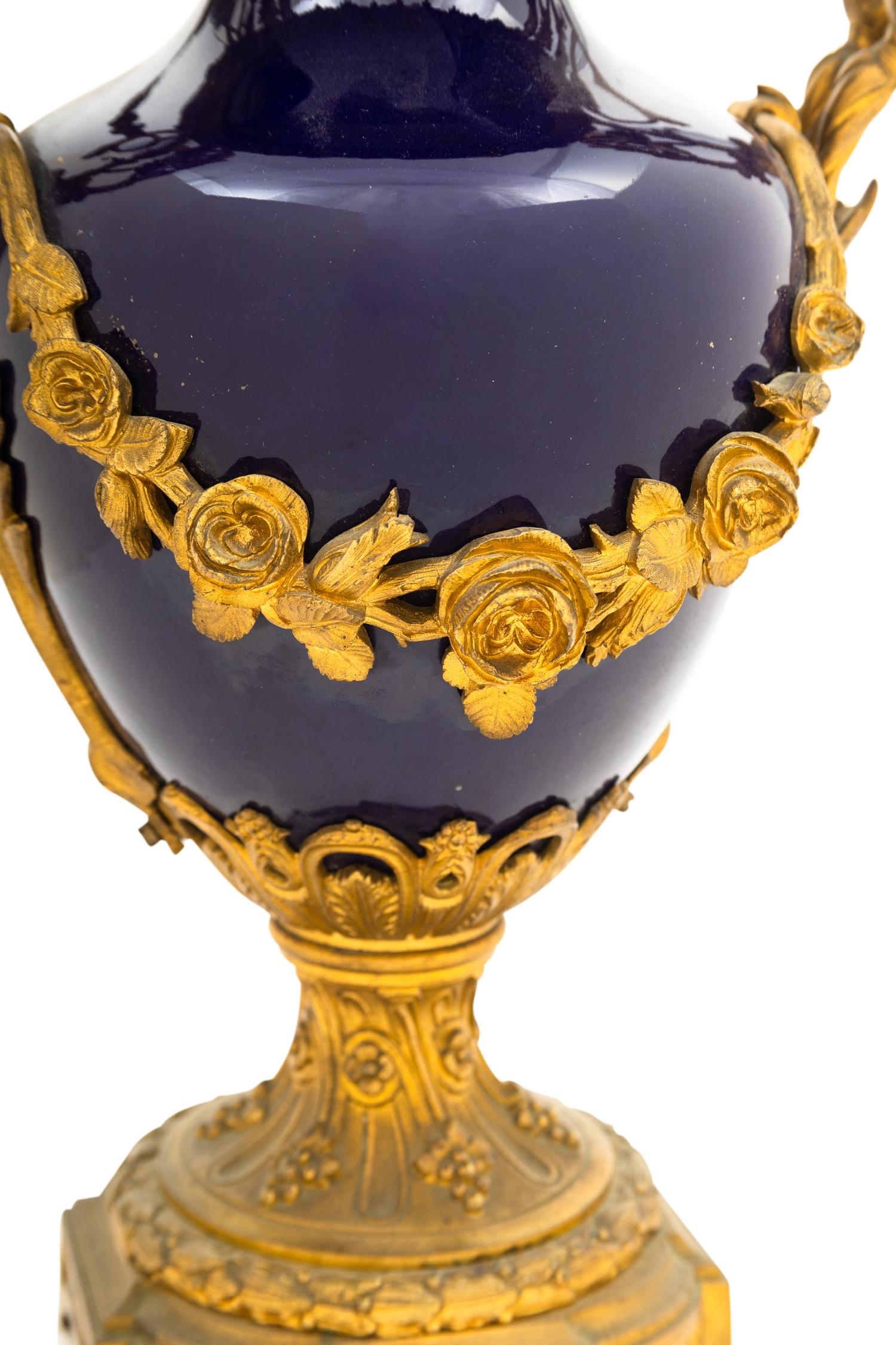 A Sèvres Style Gilt Bronze Mounted Porcelain Urn