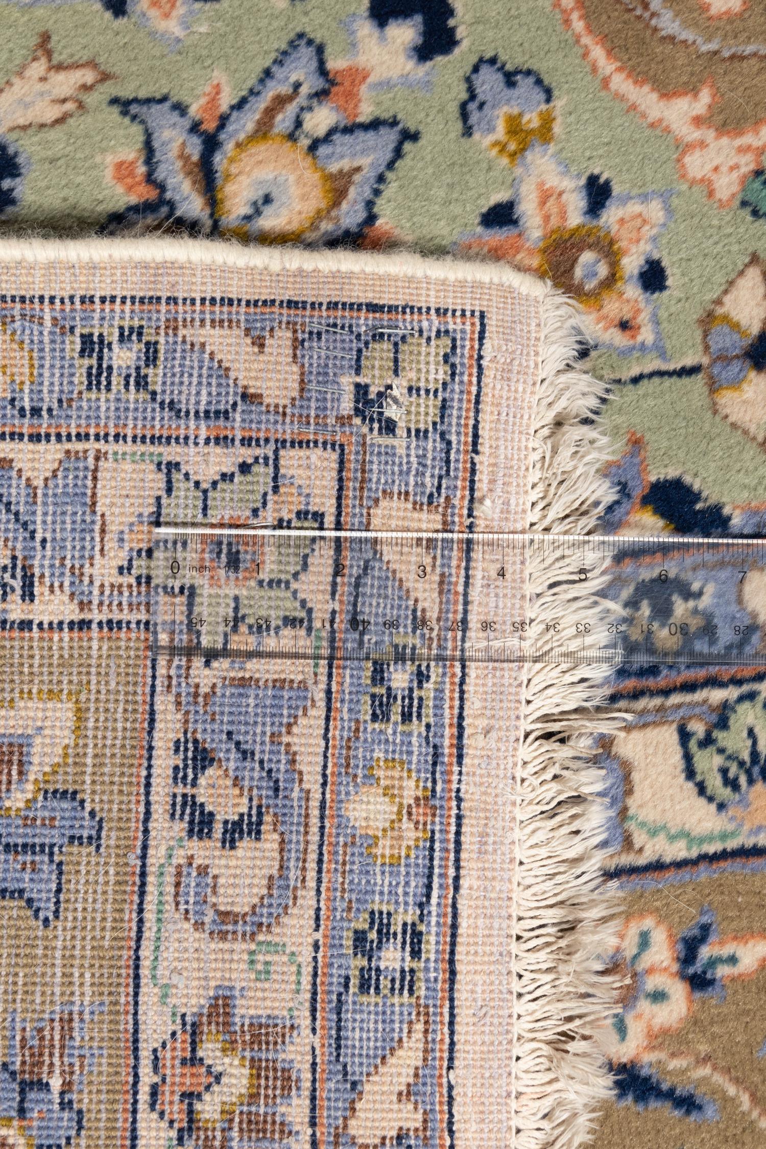 A Kashan Wool Rug
