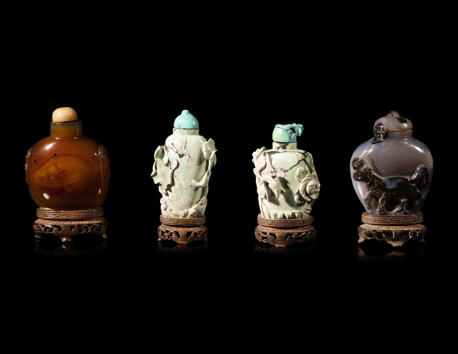 Four Chinese Carved Hardstone Snuff Bottles