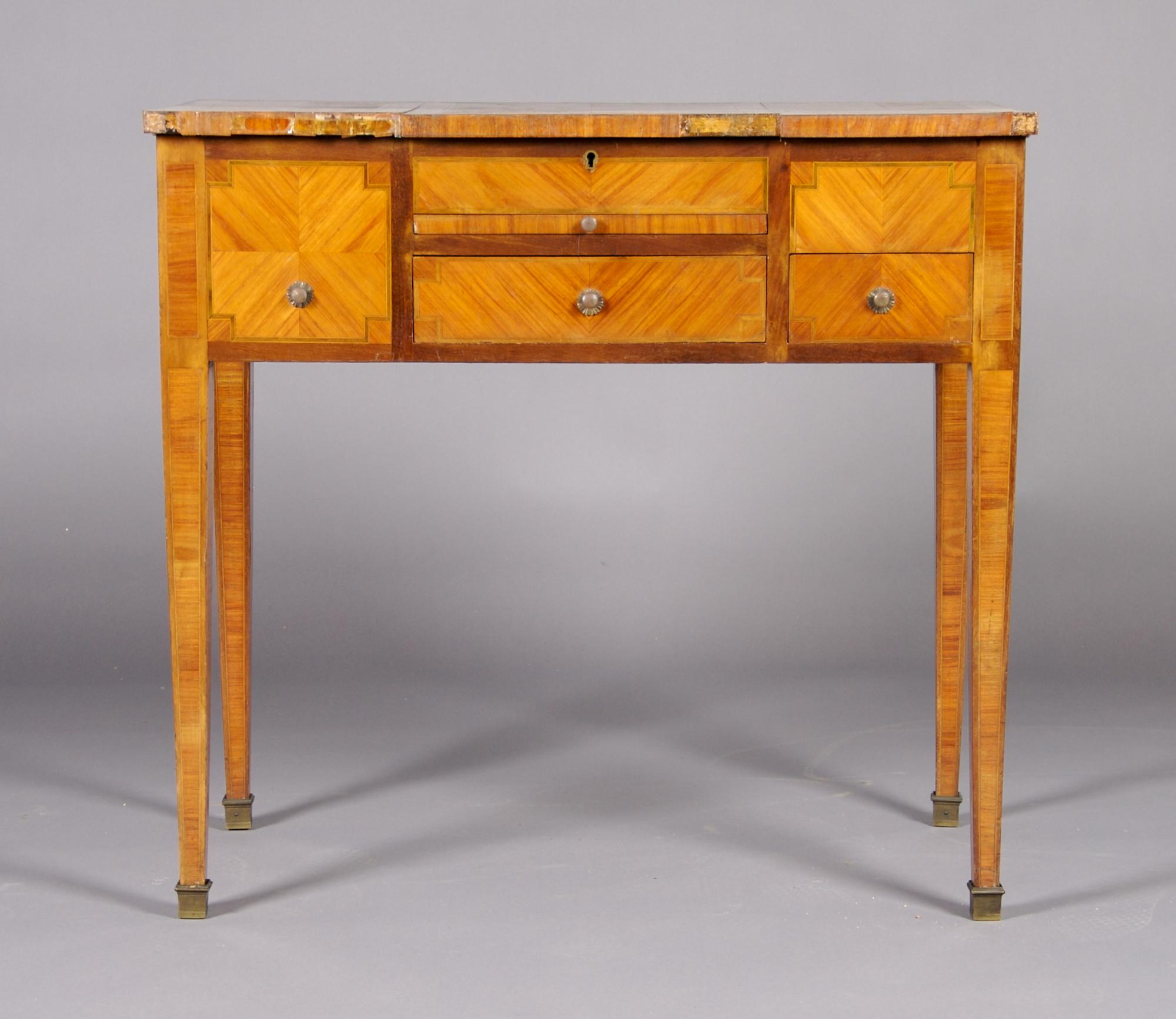 A Louis XVI Style Parquetry Poudreuse, Height 29 x width 31 1/2 x depth 17 5/8 inches.