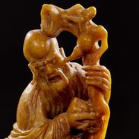 Two carved Chinese soapstone figures: Shoulao and attendant, and Liuhai and attendant 壽山石雕劉海壽老兩件 Late Qing to Republic period ?????