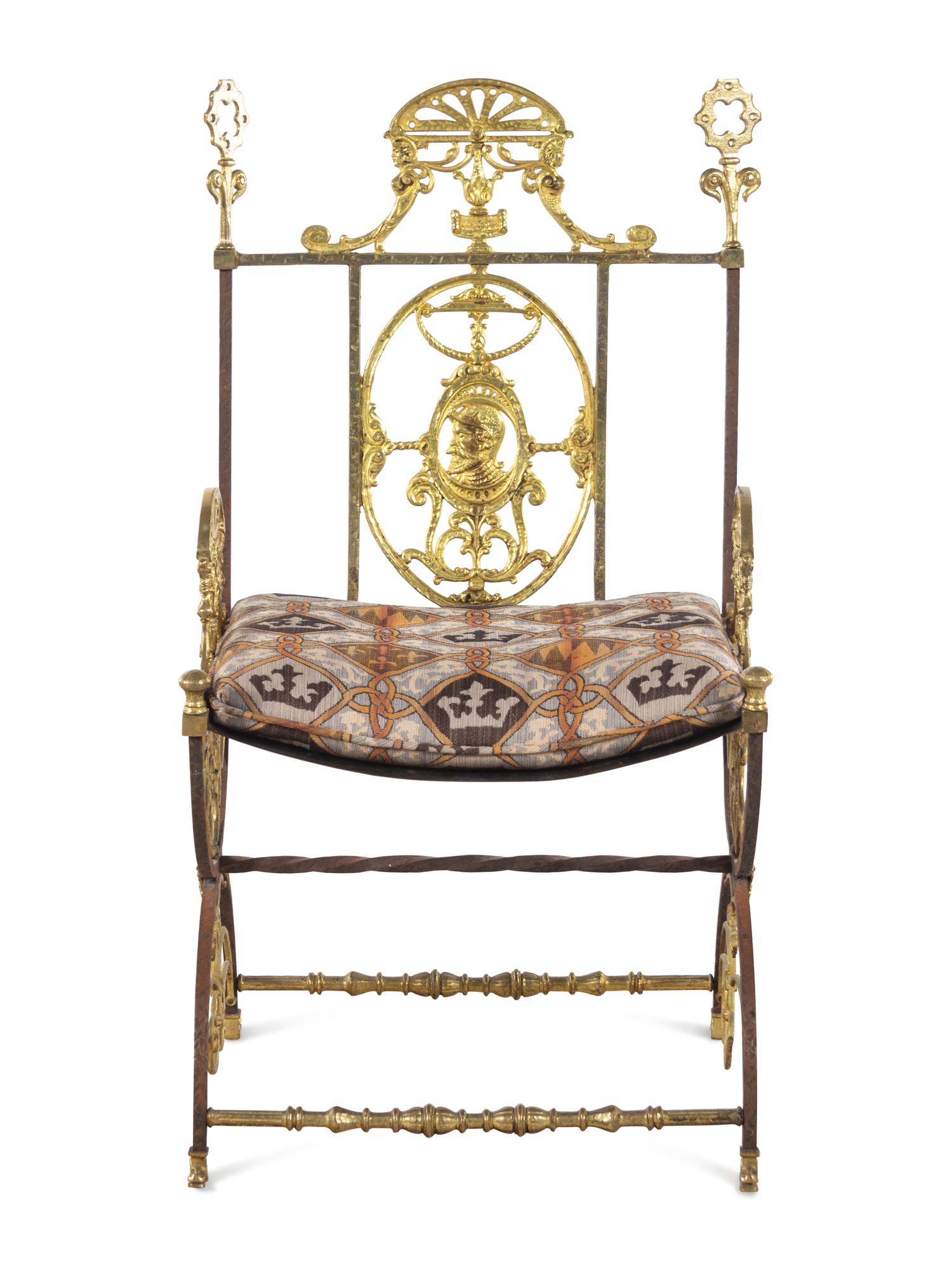 A Neoclassical Iron and Bronze Chair in the Style of Oscar Bach