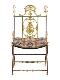 A Neoclassical Iron and Bronze Chair in the Style of Oscar Bach