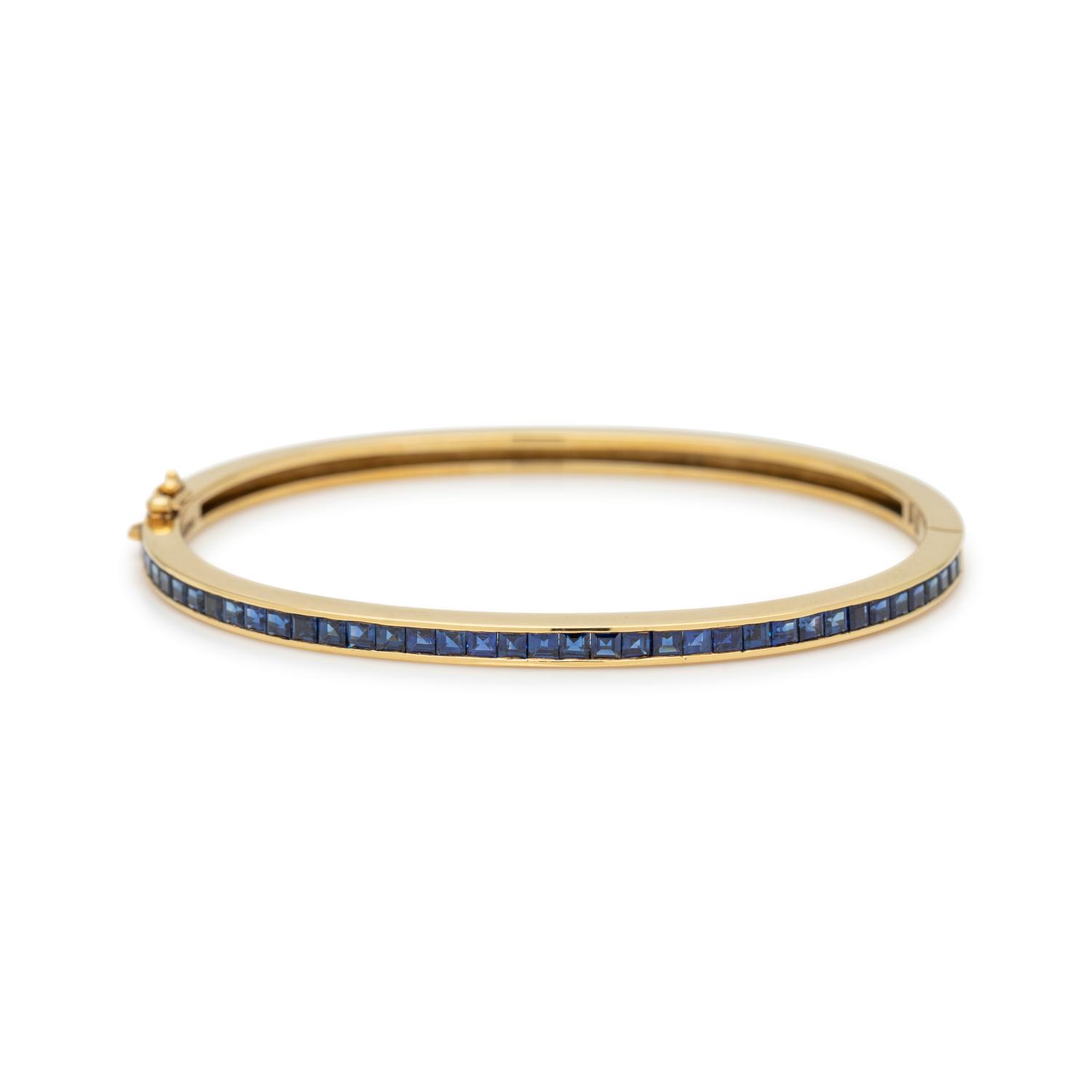 SCHLUGER, DIAMOND, SAPPHIRE AND EMERALD BANGLE BRACELET SET