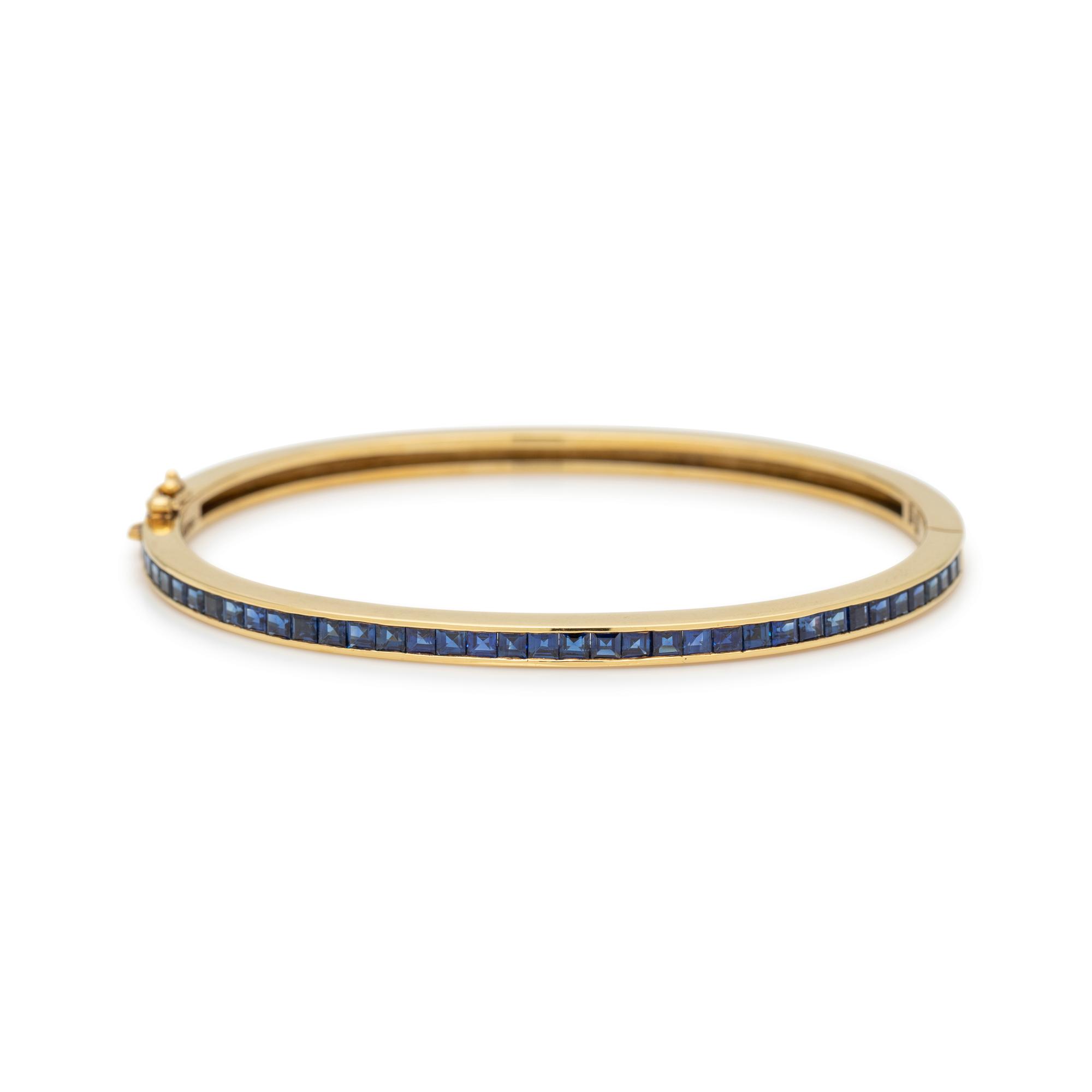 SCHLUGER, DIAMOND, SAPPHIRE AND EMERALD BANGLE BRACELET SET