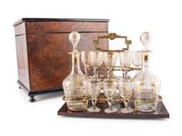 A Burlwood Inlaid Tantalus