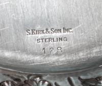 A Set of Sixteen American Silver Bread Plates, S. Kirk & Son, Baltimore, MD, Circa 1930, circular, the borders chased with dense flower
