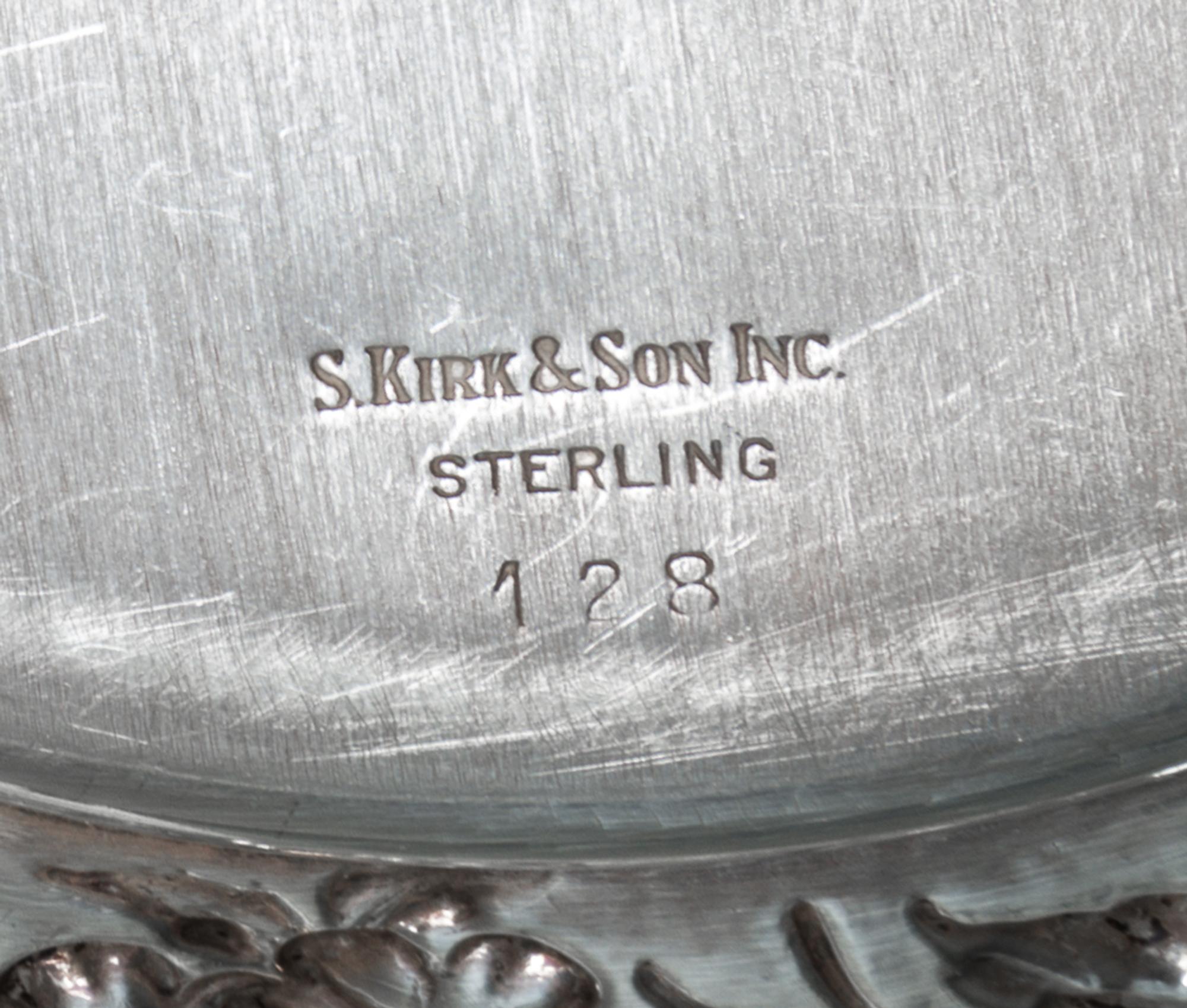 A Set of Sixteen American Silver Bread Plates, S. Kirk & Son, Baltimore, MD, Circa 1930, circular, the borders chased with dense flower