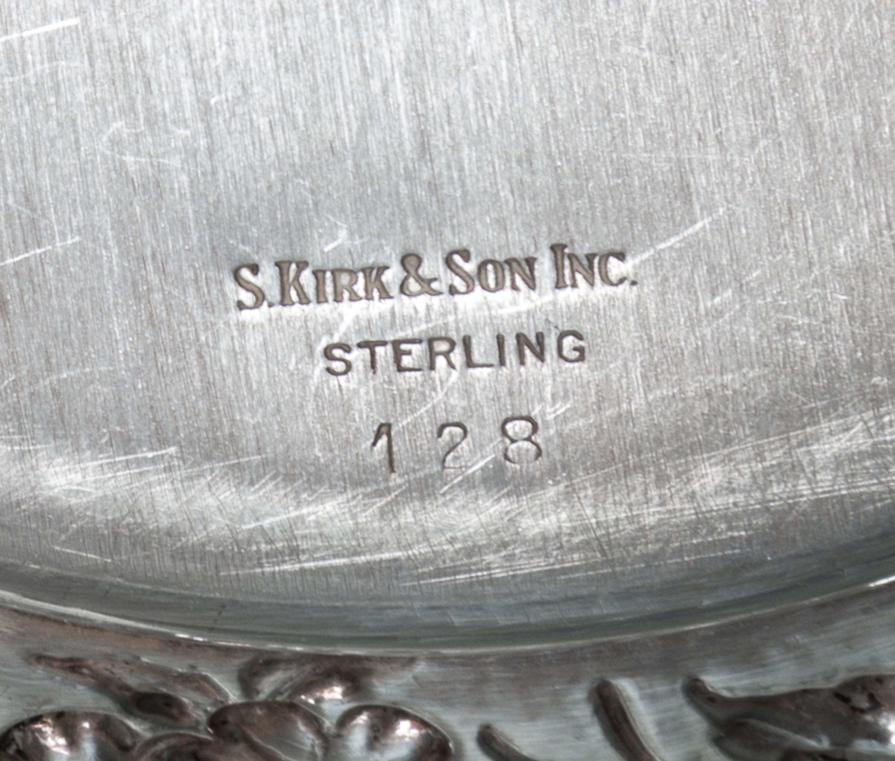 A Set of Sixteen American Silver Bread Plates, S. Kirk & Son, Baltimore, MD, Circa 1930, circular, the borders chased with dense flower