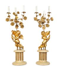 A Pair of Louis XVI Style Six-Light Giltwood Figural Candelabra