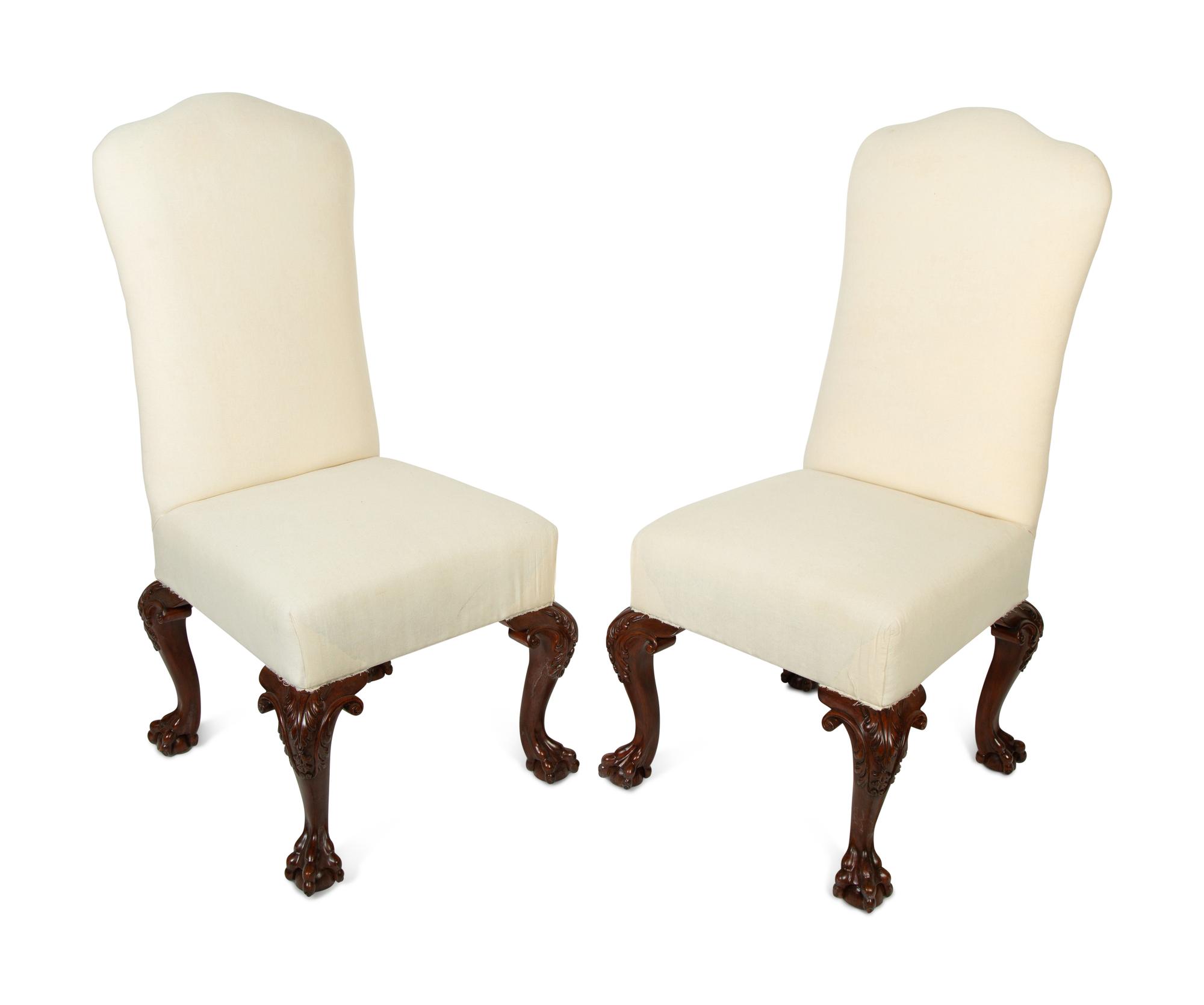 A Set of Six George II Style Carved Dining Chairs
